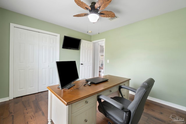 1052 Ashley Rd, Milton, FL 32583 - home office featuring a ceiling fan, baseboards, and dark wood finished floors