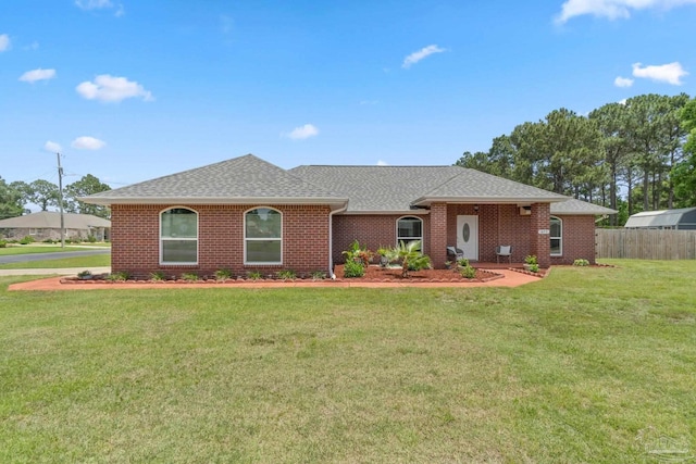 1052 Ashley Rd, Milton, FL 32583 - ranch-style house with roof with shingles and brick siding