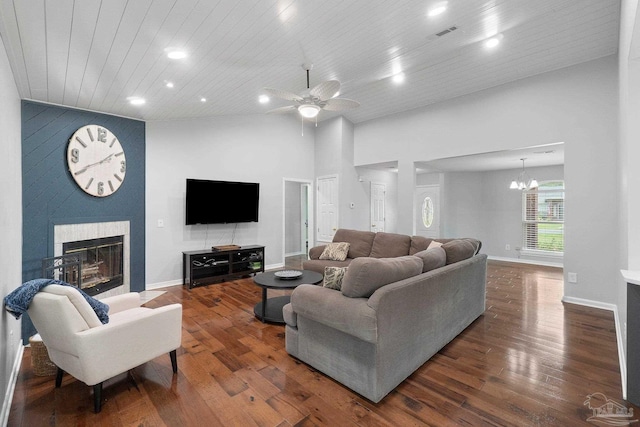 1052 Ashley Rd, Milton, FL 32583 - living area with ceiling fan, a fireplace, dark wood-style flooring, high vaulted ceiling, and wood ceiling