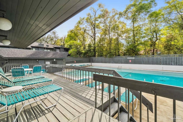 view of pool featuring a wooden deck