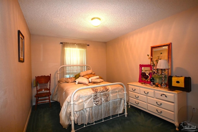 carpeted bedroom with a textured ceiling