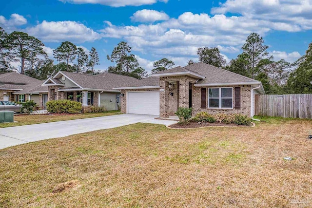 single story home featuring a garage and a front lawn