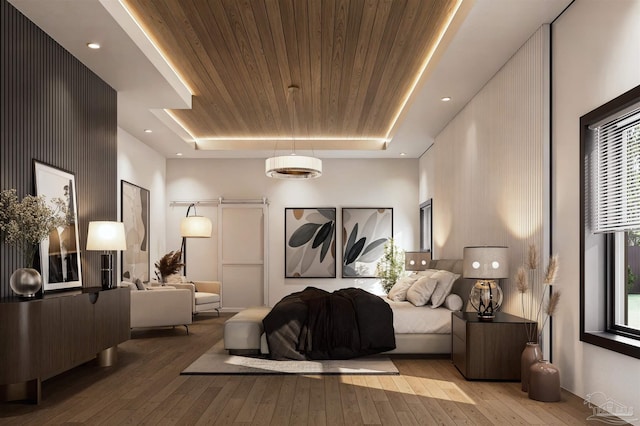 bedroom with a barn door, wooden ceiling, recessed lighting, hardwood / wood-style floors, and a raised ceiling