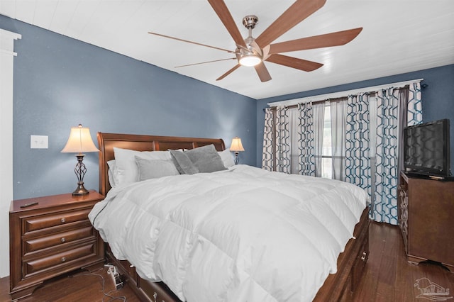 bedroom featuring wood finished floors and ceiling fan
