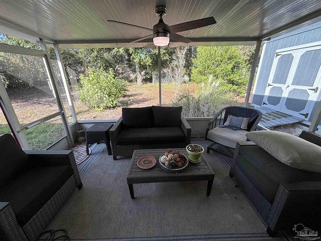 sunroom / solarium with ceiling fan