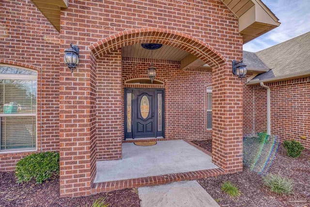 entrance to property with a porch