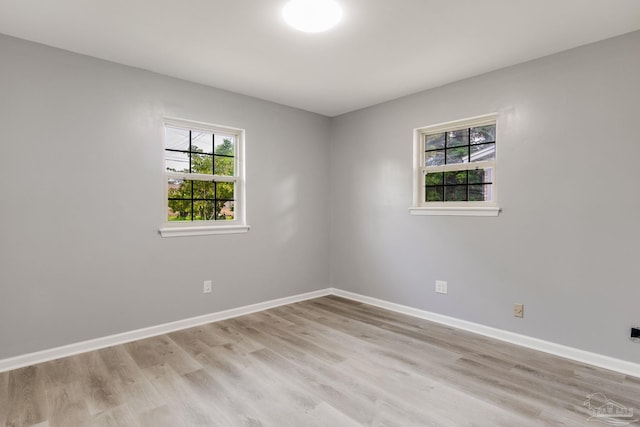 empty room featuring hardwood / wood-style flooring