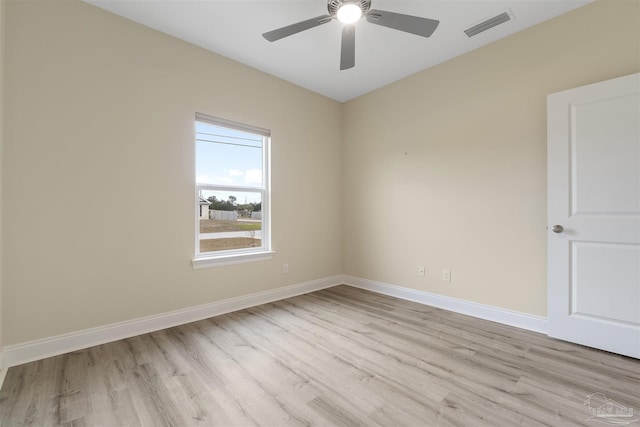 unfurnished room with ceiling fan and light hardwood / wood-style flooring