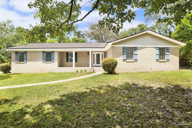 1118 Tall Pine Trl, Gulf Breeze, FL 32561 - ranch-style home with brick siding and a front lawn