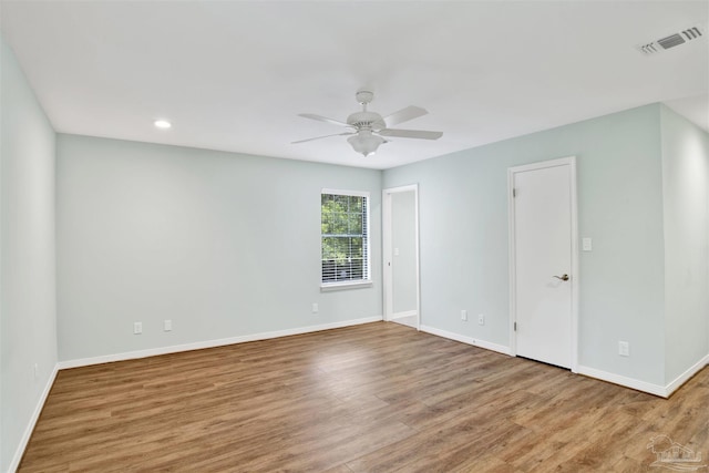 1118 Tall Pine Trl, Gulf Breeze, FL 32561 - spare room featuring a ceiling fan, baseboards, wood finished floors, and recessed lighting