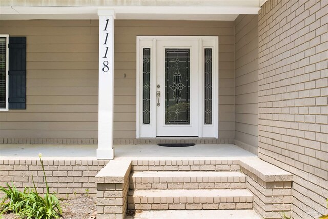 1118 Tall Pine Trl, Gulf Breeze, FL 32561 - property entrance featuring a porch