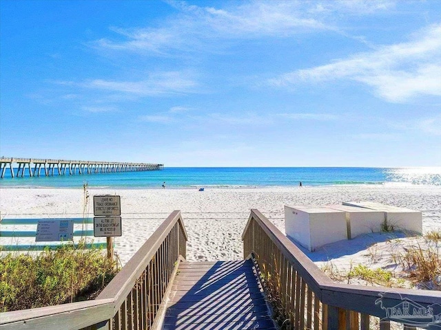 property view of water featuring a beach view