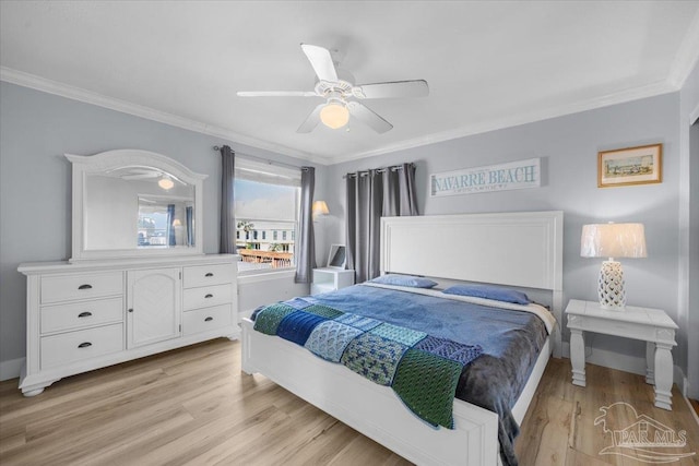 bedroom with ceiling fan, ornamental molding, and light hardwood / wood-style flooring