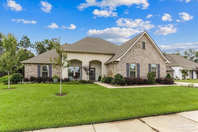 3160 Mountain Laurel Trl, Cantonment, FL 32533 - traditional-style home with brick siding and a front yard