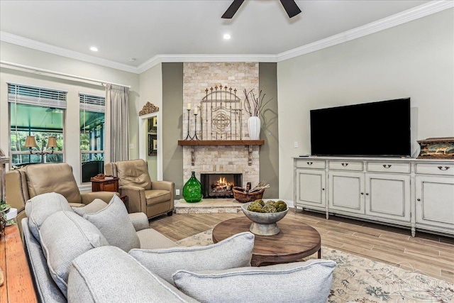 3160 Mountain Laurel Trl, Cantonment, FL 32533 - living area with ornamental molding, ceiling fan, light wood-style floors, a fireplace, and recessed lighting