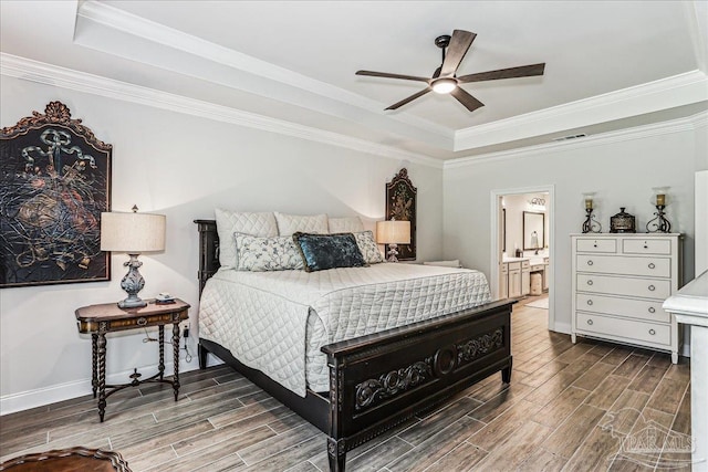 3160 Mountain Laurel Trl, Cantonment, FL 32533 - bedroom with a raised ceiling, wood finished floors, ornamental molding, ensuite bathroom, and a ceiling fan
