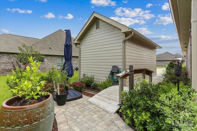 3160 Mountain Laurel Trl, Cantonment, FL 32533 - view of side of home with a patio area