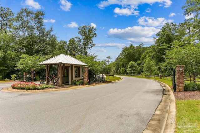 3160 Mountain Laurel Trl, Cantonment, FL 32533 - view of asphalt road featuring curbs