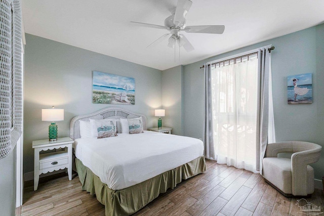 bedroom featuring ceiling fan and hardwood / wood-style flooring