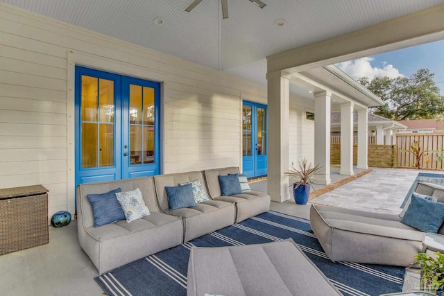 view of patio featuring ceiling fan and french doors