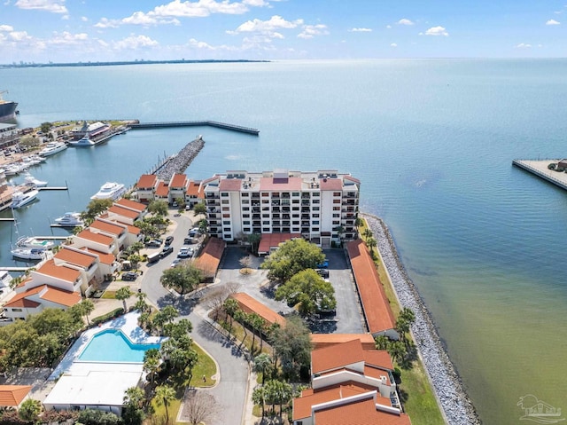 birds eye view of property with a water view