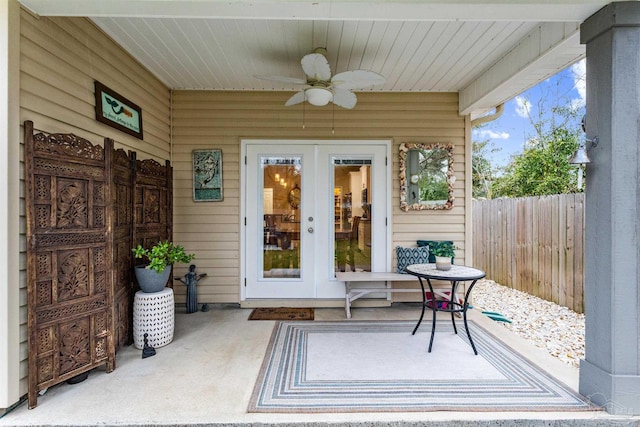 view of patio featuring ceiling fan and french doors