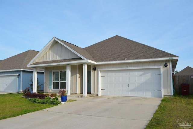 view of front facade featuring a garage and a front yard