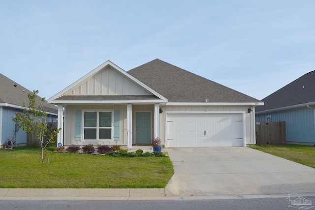 view of front facade featuring a garage and a front yard