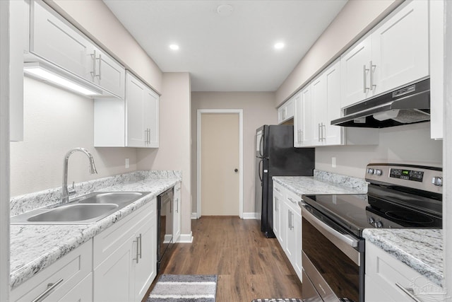 kitchen with white cabinets, sink, and black appliances