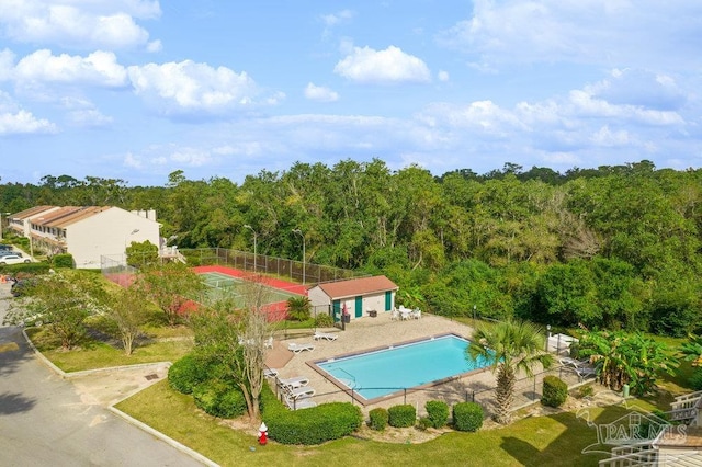 view of pool featuring a patio