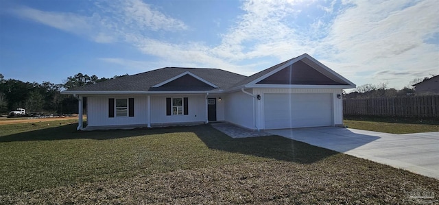 ranch-style home with a garage and a front yard