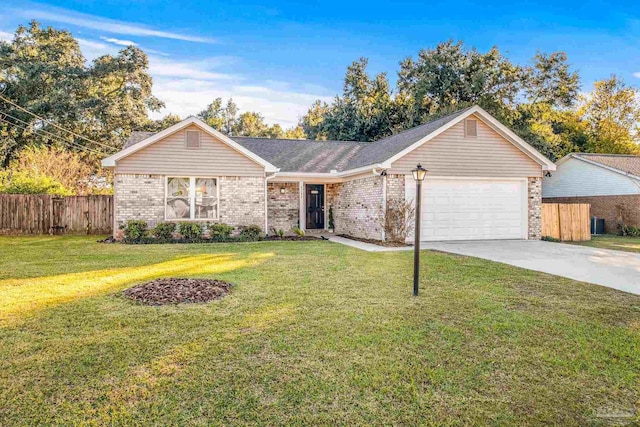 ranch-style home with a front lawn and a garage