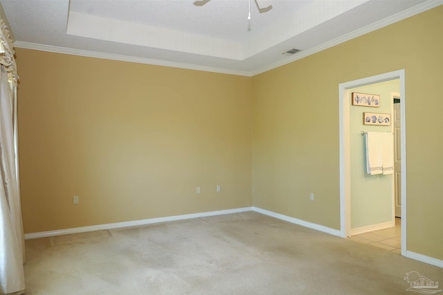 1200 Willowood Ln, Gulf Breeze, FL 32563 - empty room with a raised ceiling, crown molding, light colored carpet, and ceiling fan