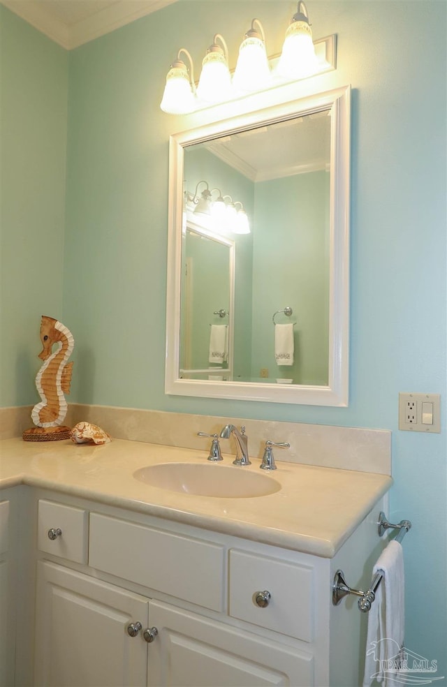 1200 Willowood Ln, Gulf Breeze, FL 32563 - bathroom featuring crown molding and vanity