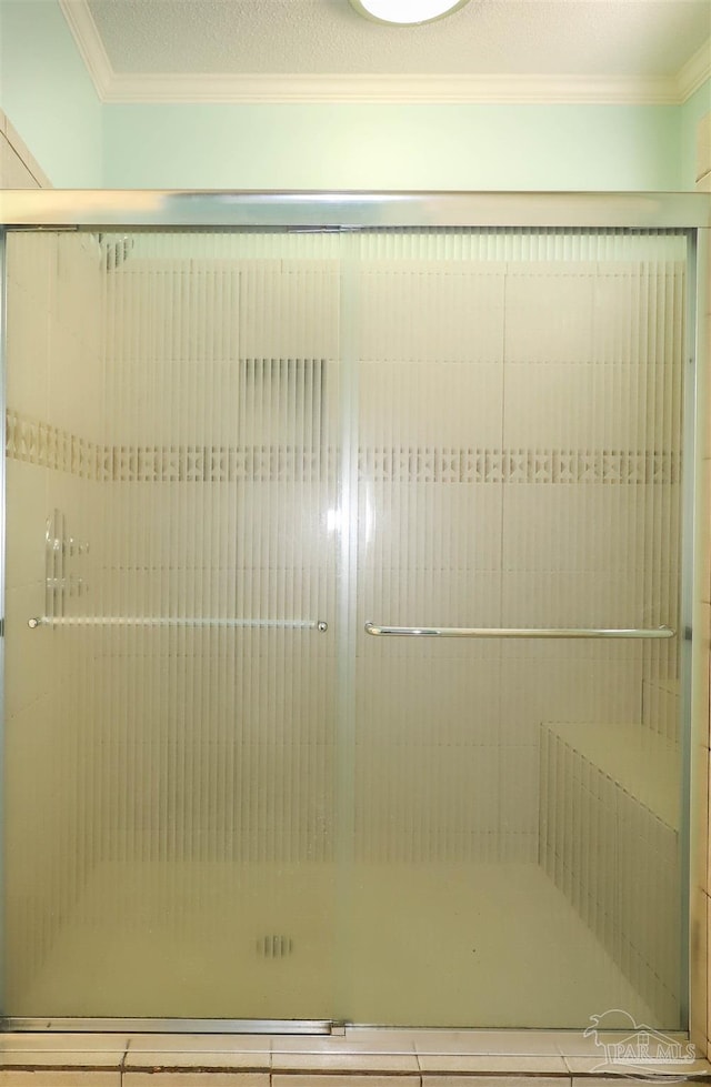 1200 Willowood Ln, Gulf Breeze, FL 32563 - bathroom with crown molding and a shower stall