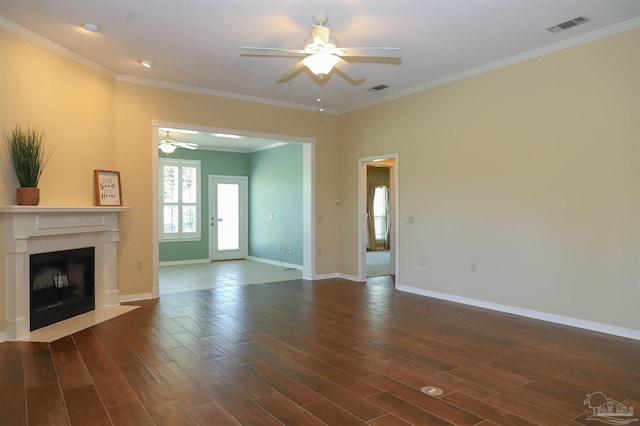 1200 Willowood Ln, Gulf Breeze, FL 32563 - unfurnished living room with dark wood-style flooring, baseboards, a ceiling fan, and visible vents