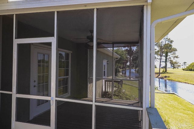 1200 Willowood Ln, Gulf Breeze, FL 32563 - unfurnished sunroom with a water view and a ceiling fan