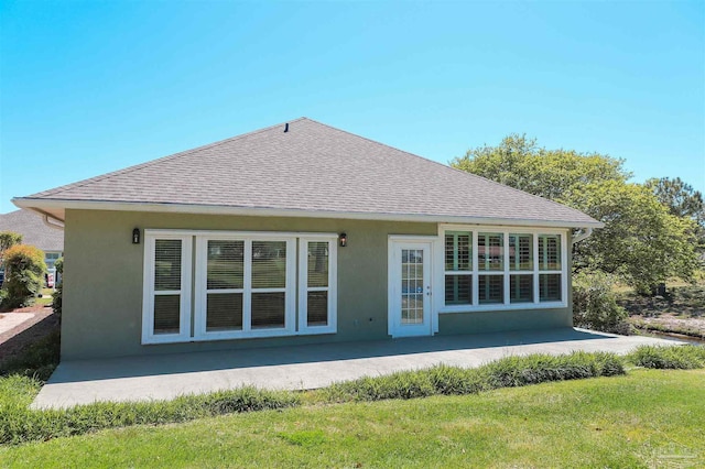 1200 Willowood Ln, Gulf Breeze, FL 32563 - rear view of property with a patio area, roof with shingles, and stucco siding
