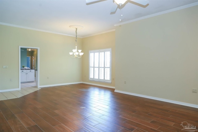 1200 Willowood Ln, Gulf Breeze, FL 32563 - empty room featuring ornamental molding, baseboards, wood finished floors, and ceiling fan with notable chandelier