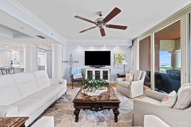721 Pensacola Beach Blvd Unit 702, Pensacola Beach, FL 32561 - living room with ornamental molding, ceiling fan, and wood finished floors