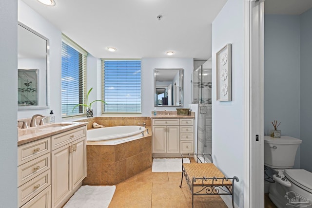 721 Pensacola Beach Blvd Unit 702, Pensacola Beach, FL 32561 - bathroom featuring vanity, tile patterned floors, a bath, and a stall shower