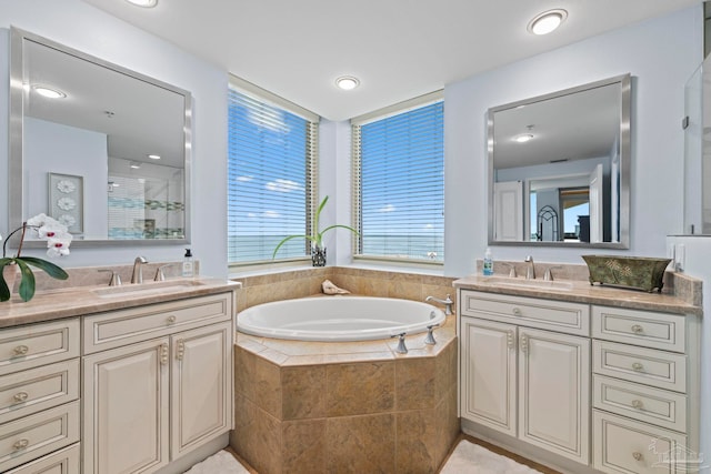 721 Pensacola Beach Blvd Unit 702, Pensacola Beach, FL 32561 - full bathroom featuring two vanities, a garden tub, and a tile shower