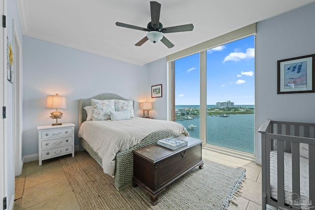 721 Pensacola Beach Blvd Unit 702, Pensacola Beach, FL 32561 - bedroom with a water view, floor to ceiling windows, light tile patterned flooring, ceiling fan, and access to exterior