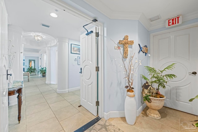 721 Pensacola Beach Blvd Unit 702, Pensacola Beach, FL 32561 - hallway with ornate columns, light tile patterned floors, and crown molding