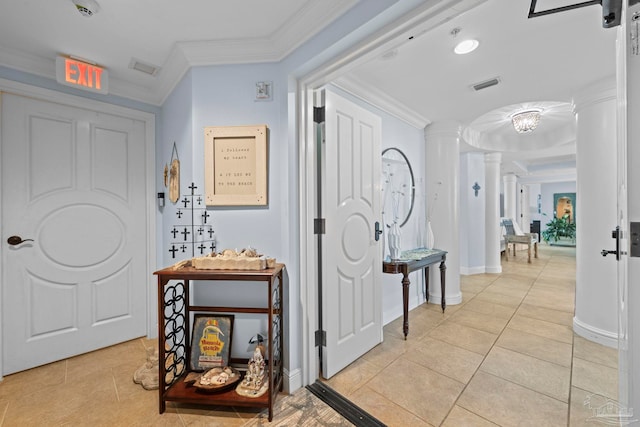 721 Pensacola Beach Blvd Unit 702, Pensacola Beach, FL 32561 - entrance foyer featuring ornate columns, crown molding, and light tile patterned floors
