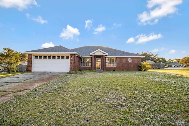 single story home featuring a garage, driveway, fence, a front yard, and brick siding