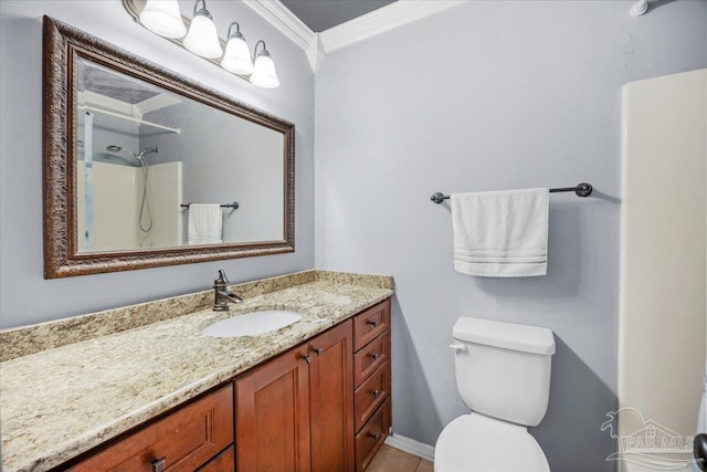 full bathroom featuring ornamental molding, toilet, vanity, baseboards, and a shower