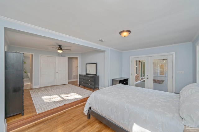 4900 Shell Rd, Milton, FL 32583 - bedroom with visible vents, ornamental molding, wood finished floors, french doors, and access to exterior