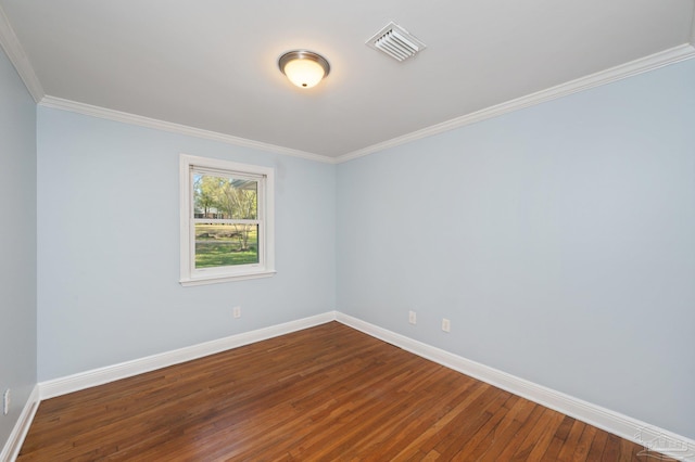 4900 Shell Rd, Milton, FL 32583 - unfurnished room featuring dark wood finished floors, crown molding, baseboards, and visible vents