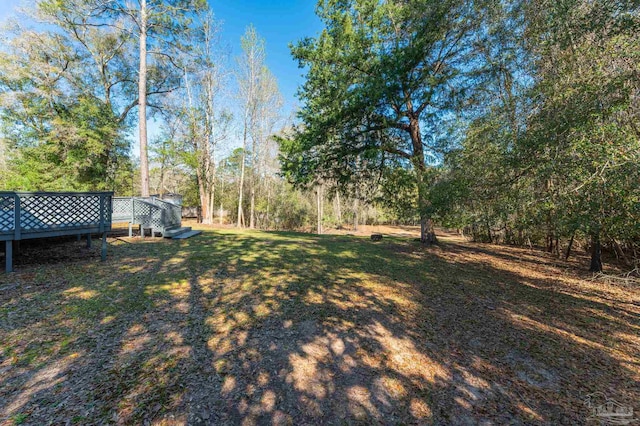4900 Shell Rd, Milton, FL 32583 - view of yard featuring a wooden deck